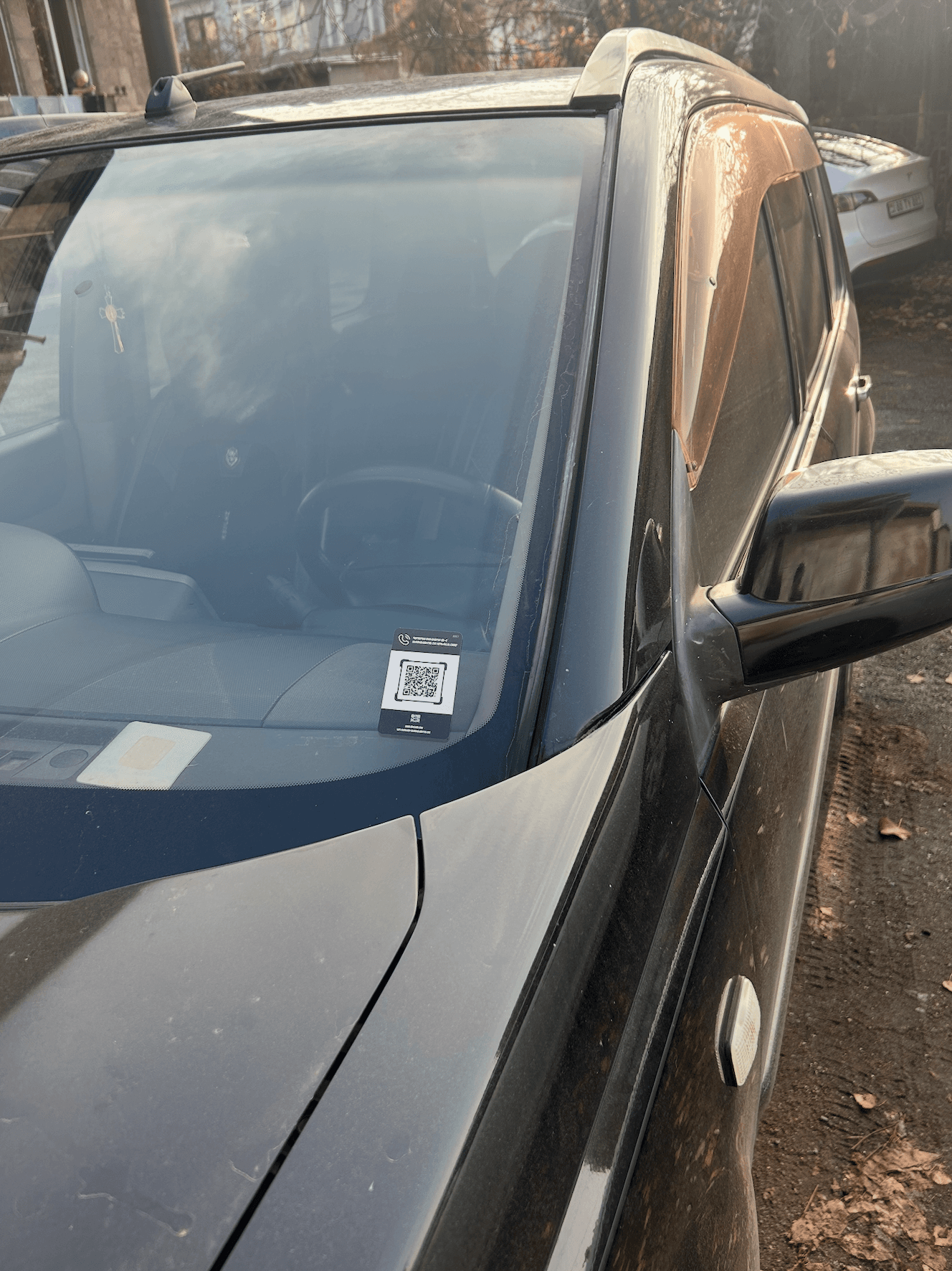 Close-up of QR4CARS sticker in use
